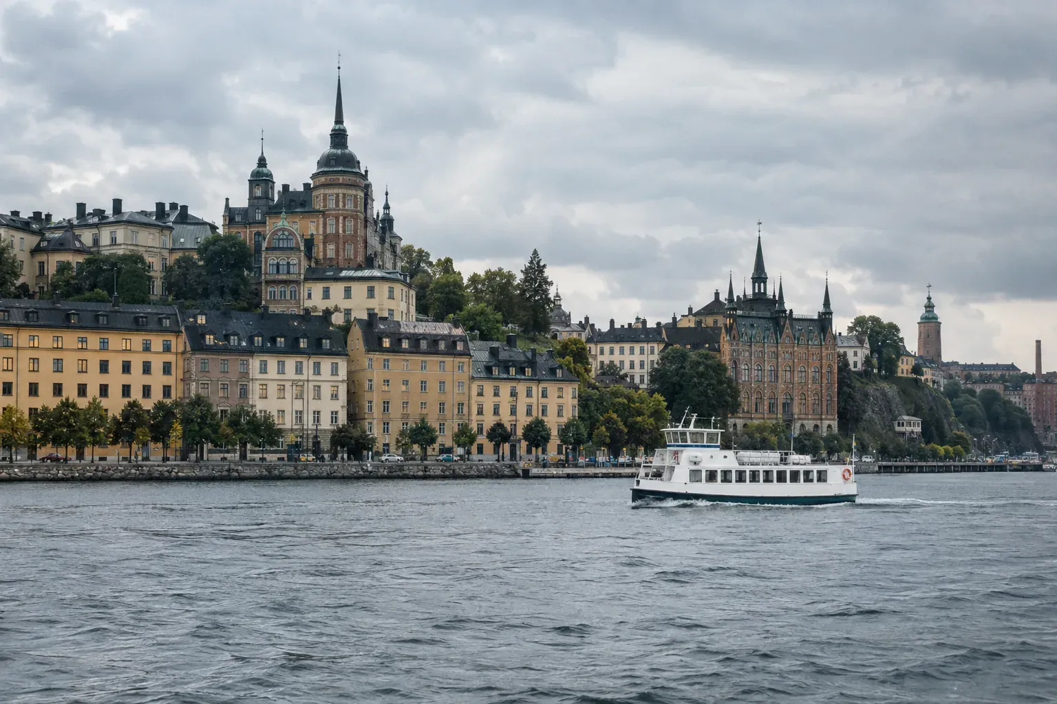 Sample image of a white ferry passing historic buildings in Stockholm